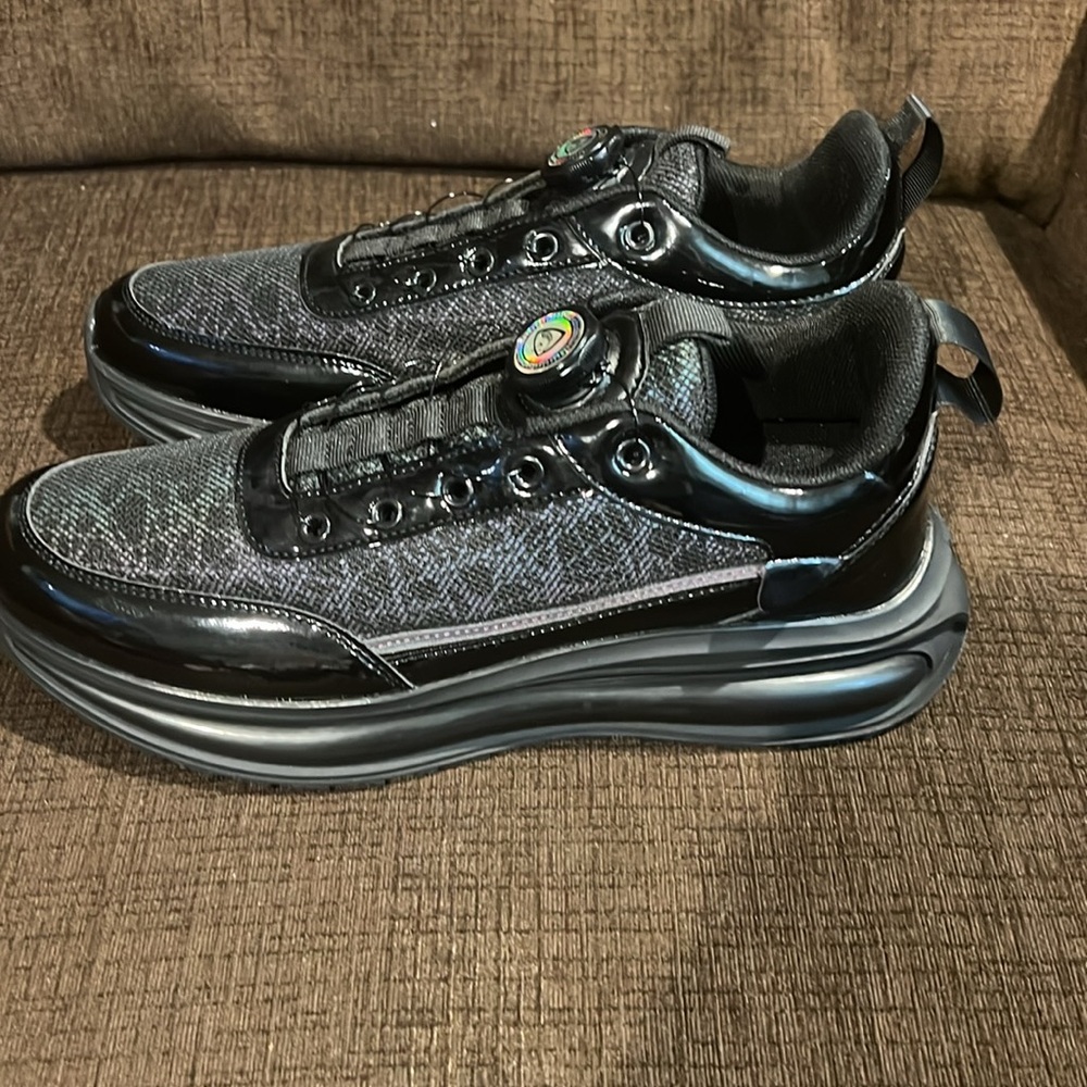 Stylish Black and Patent Leather Trim Sneakers with unique twist knob laces. - Picture 4 of 9